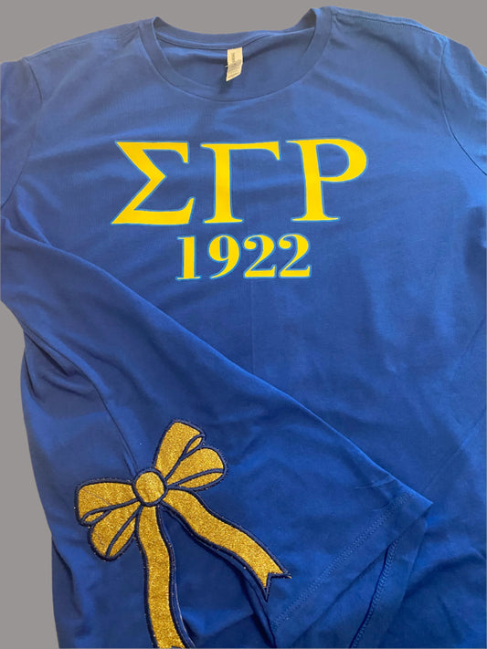 Sigma Gamma Rho Bella+Canvas Women’s Relaxed T-Shirt – 1922 Gold Bow Edition